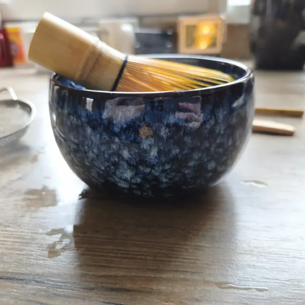 Blue matcha set photographed in natural light on a customer kitchen counter